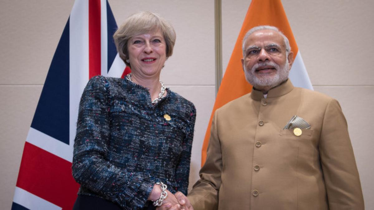 Theresa Mays talks with Modi to focus on defence, trade